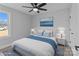 Virtually staged bedroom with a queen bed and ample natural light at 528 Moss Springs Rd, Albemarle, NC 28001