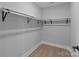 Spacious walk-in closet with double hanging rods at 528 Moss Springs Rd, Albemarle, NC 28001