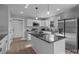 Modern kitchen with stainless steel appliances and an island at 528 Moss Springs Rd, Albemarle, NC 28001