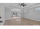 Open concept living room with kitchen view and hardwood floors at 528 Moss Springs Rd, Albemarle, NC 28001