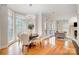 Breakfast nook with hardwood floors and access to the kitchen and back porch at 2804 Providence View Ln, Charlotte, NC 28270