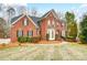 Two story brick home with a spacious yard and basketball goal at 2804 Providence View Ln, Charlotte, NC 28270