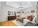 Spacious main bedroom with hardwood floors and large chandelier at 2804 Providence View Ln, Charlotte, NC 28270