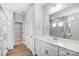 Modern bathroom with marble tile and double vanity at 5308 Verona Rd # 75, Charlotte, NC 28213