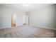 Spacious bedroom with carpet flooring and an ensuite bathroom at 5308 Verona Rd # 75, Charlotte, NC 28213