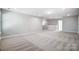 Spacious bedroom with carpet and access to hallway at 5308 Verona Rd # 75, Charlotte, NC 28213