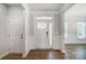 Bright entryway with hardwood floors and white trim at 5308 Verona Rd # 75, Charlotte, NC 28213