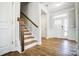 Bright entryway with hardwood floors and staircase at 5308 Verona Rd # 75, Charlotte, NC 28213