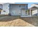 Gray house exterior with backyard and patio at 5308 Verona Rd # 75, Charlotte, NC 28213