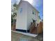 Exterior view shows rear elevation and outdoor access via wooden staircase at 1137 6Th St, Lancaster, SC 29720