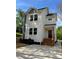 Charming two-story home with covered porch and landscaped yard at 1137 6Th St, Lancaster, SC 29720
