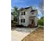 Charming two-story home with a well-manicured lawn and inviting entrance at 1137 6Th St, Lancaster, SC 29720