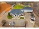 Aerial view of clubhouse, driving range, and pond at 108 Fleming Dr, Statesville, NC 28677