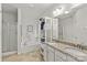 Bathroom with double vanity, soaking tub, and walk-in shower at 108 Fleming Dr, Statesville, NC 28677