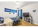 Seattle Seahawks themed bedroom with a twin bed, TV, and window at 108 Fleming Dr, Statesville, NC 28677