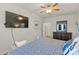 Spacious bedroom with large TV and comfortable seating area at 108 Fleming Dr, Statesville, NC 28677