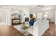 Inviting living room featuring a fireplace, hardwood floors, and comfortable seating at 2105 Kennedy Dr, Indian Land, SC 29707