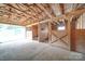 Barn interior featuring horse stalls with wooden construction and open rafters at 3814 Watson Church Rd, Monroe, NC 28110