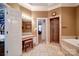 Well-lit bathroom showcasing separate shower, vanity, and soaking tub at 3814 Watson Church Rd, Monroe, NC 28110