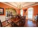 Elegant dining room featuring a decorative chandelier and seating for eight at 3814 Watson Church Rd, Monroe, NC 28110