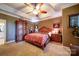 Charming main bedroom featuring trey ceiling, wardrobe, and bedside tables at 3814 Watson Church Rd, Monroe, NC 28110