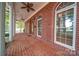 Brick patio with classic columns, arched windows and a double door entry way to the home at 3814 Watson Church Rd, Monroe, NC 28110