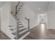 Welcoming entryway with hardwood floors, staircase and white painted trim at 633 Amberjack Pl, York, SC 29745