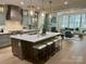 A sleek kitchen features stainless steel appliances, a large center island, and stylish pendant lighting at 4031 Pritchard Pl, Fort Mill, SC 29715