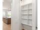 Walk-in pantry featuring custom shelving and storage at 4031 Pritchard Pl, Fort Mill, SC 29715