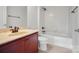 Clean bathroom with single vanity, bathtub, and tile flooring at 3012 Wheatfield Dr, Waxhaw, NC 28173