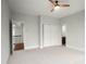 Spacious bedroom with ceiling fan,carpet, and access to a hallway at 3012 Wheatfield Dr, Waxhaw, NC 28173
