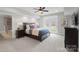 Basement bedroom with ensuite bathroom and backyard access at 3012 Wheatfield Dr, Waxhaw, NC 28173
