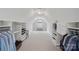 Large walk-in closet with ample shelving and hanging space at 3012 Wheatfield Dr, Waxhaw, NC 28173