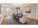 Formal dining room with hardwood floors and a chandelier at 3012 Wheatfield Dr, Waxhaw, NC 28173