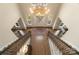 Grand two story entryway with hardwood floors and chandelier at 3012 Wheatfield Dr, Waxhaw, NC 28173