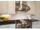 Stainless steel range and dark granite countertops at 3012 Wheatfield Dr, Waxhaw, NC 28173