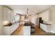 Modern kitchen with white cabinets, granite counters and island at 3012 Wheatfield Dr, Waxhaw, NC 28173