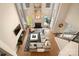 High ceiling living room with sectional sofa and pool view at 3012 Wheatfield Dr, Waxhaw, NC 28173
