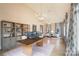 Spacious home office with built-in shelves and large windows at 3012 Wheatfield Dr, Waxhaw, NC 28173