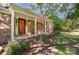 Brick front porch with red door and American flag at 816 Nightingale Rd, Rock Hill, SC 29732