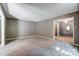 Living room with neutral walls, carpet, and view to entryway at 816 Nightingale Rd, Rock Hill, SC 29732