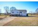 Charming two-story home with a well-maintained lawn, spacious driveway, and a basketball hoop for outdoor fun at 2725 Carla Dr, Shelby, NC 28150