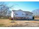 Charming two-story home with a well-maintained lawn, spacious driveway, and a basketball hoop for outdoor fun at 2725 Carla Dr, Shelby, NC 28150
