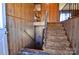 Entry staircase with metal railing and wood paneling at 2725 Carla Dr, Shelby, NC 28150