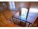 Entry staircase with metal railing and wood paneling at 2725 Carla Dr, Shelby, NC 28150