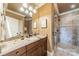 Bathroom featuring granite vanity and shower at 300 Eagle Bend Dr, Waxhaw, NC 28173