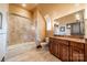 Bathroom with a shower/tub combo and granite vanity at 300 Eagle Bend Dr, Waxhaw, NC 28173