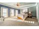 Bright bedroom with French doors and a view at 300 Eagle Bend Dr, Waxhaw, NC 28173