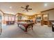 Basement game room with pool table, seating area, and wet bar at 300 Eagle Bend Dr, Waxhaw, NC 28173