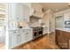 Modern kitchen boasts white cabinets, a large island, and stainless steel appliances at 300 Eagle Bend Dr, Waxhaw, NC 28173